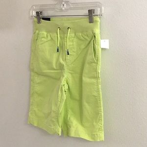 Neon yellow boys shorts.